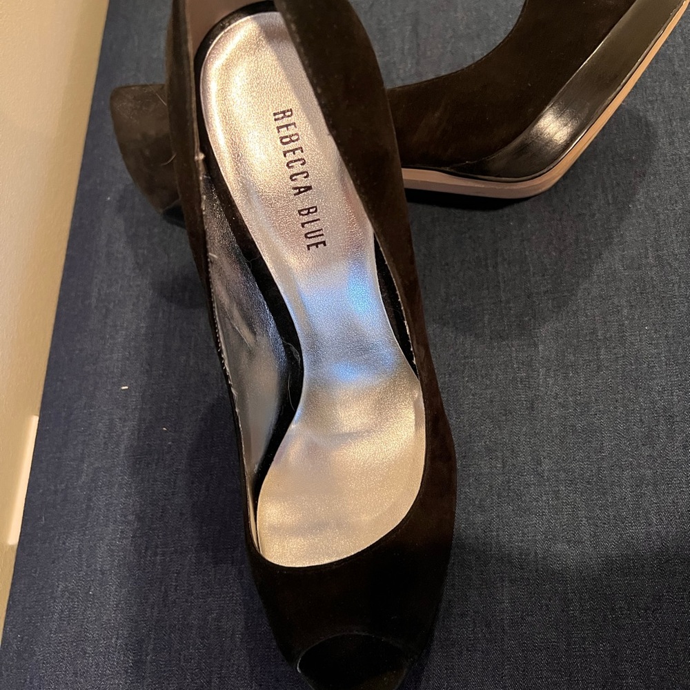 Black suede peep toe with a stacked heel